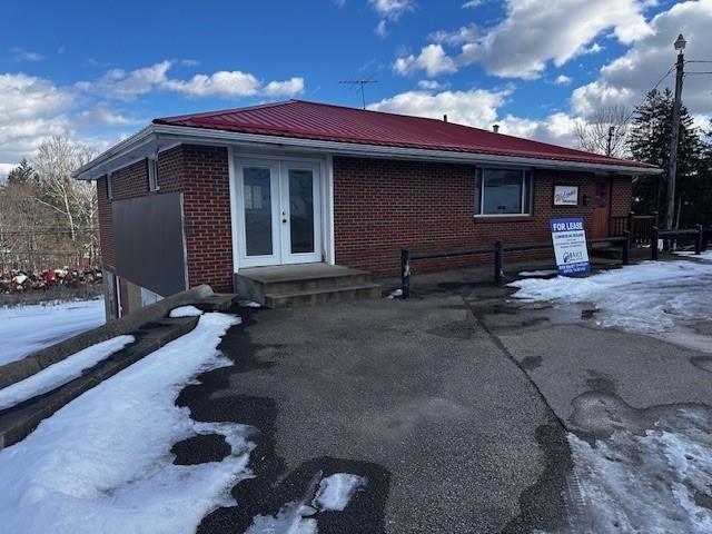 3138 Mount Morris Road Waynesburg, PA 15370 - Photo 2 of 12 a front view of a house with yard
