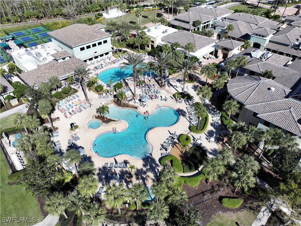 10459 Casella Way, Unit 102 Fort Myers, FL 33913 - Photo 27 of 29 an aerial view of residential house with outdoor space and parking