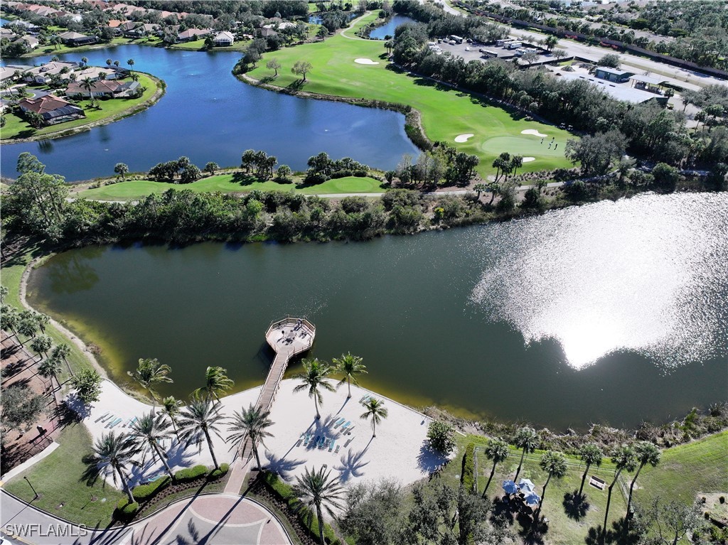 10459 Casella Way, Unit 102 Fort Myers, FL 33913 - Photo 29 of 29 an aerial view of lake residential house with outdoor space and swimming pool