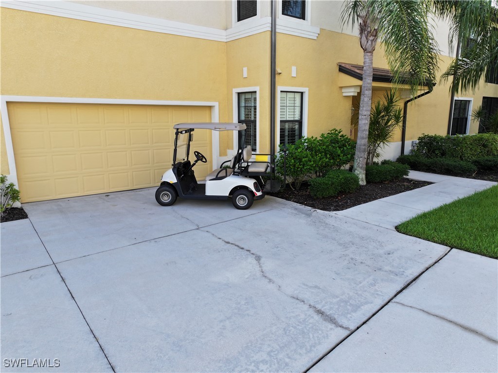 10459 Casella Way, Unit 102 Fort Myers, FL 33913 - Photo 3 of 29 a view of a building with porch and furniture