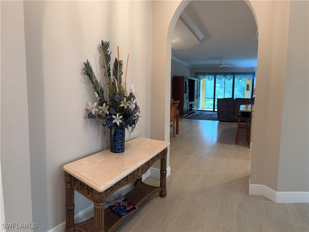 10459 Casella Way, Unit 102 Fort Myers, FL 33913 - Photo 5 of 29 a living room with furniture and a potted plant