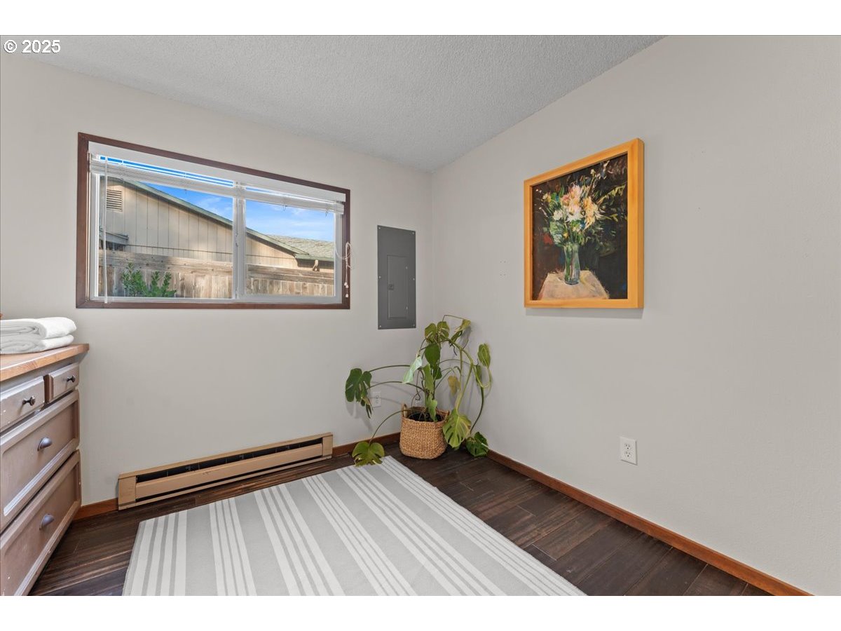 3837 North Juneau Street Portland, OR 97203 - Photo 18 of 32 a view of wooden floor in a room