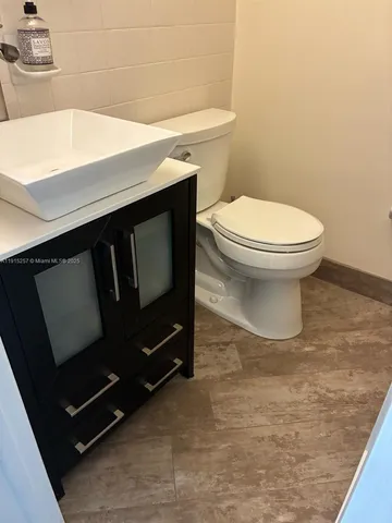 a bathroom with a sink and a toilet