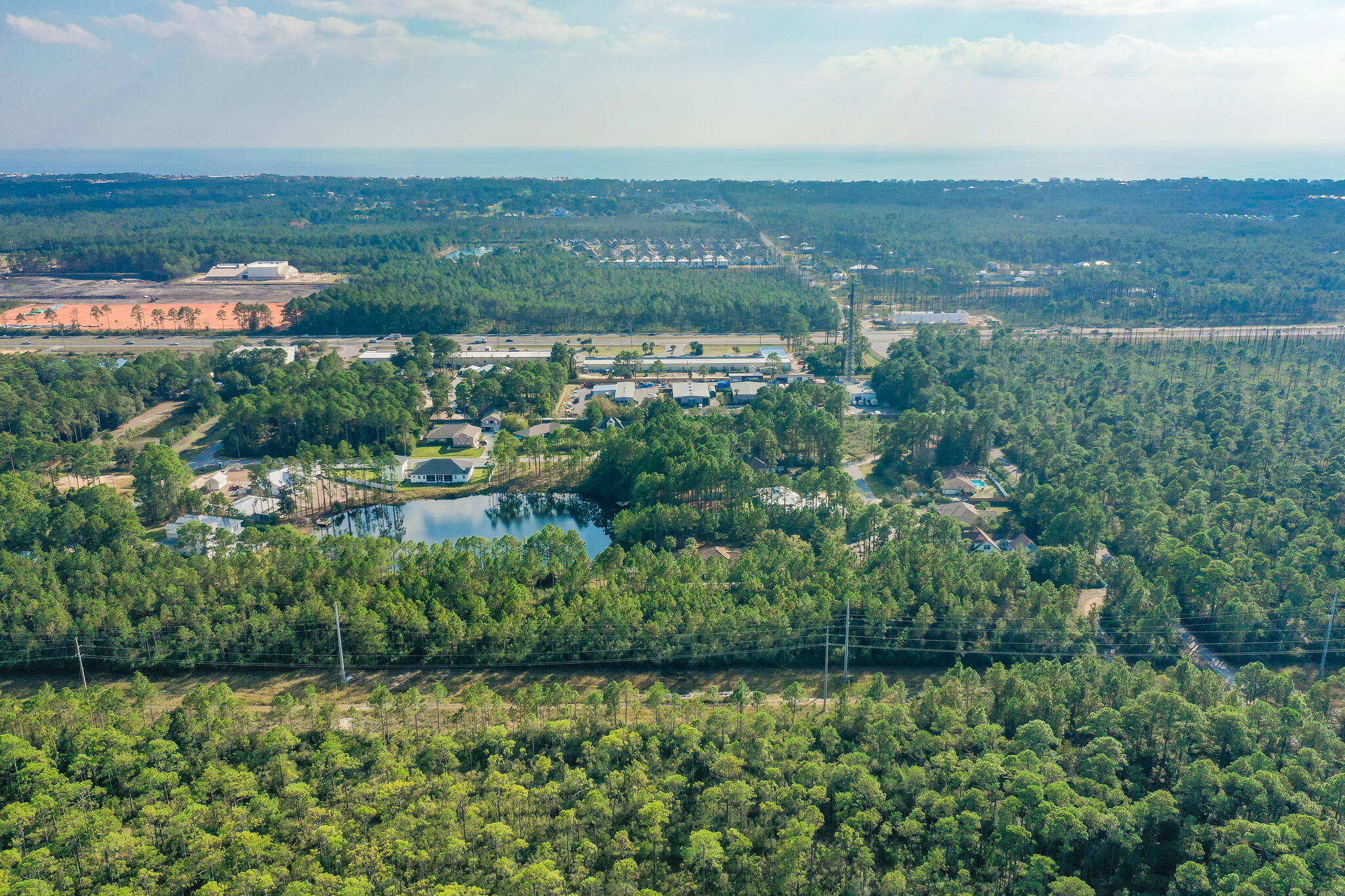 Lot 8 Bishop-Tolbert Road Santa Rosa Beach, FL 32459 - Photo 8 of 9 an aerial view of residential building and lake