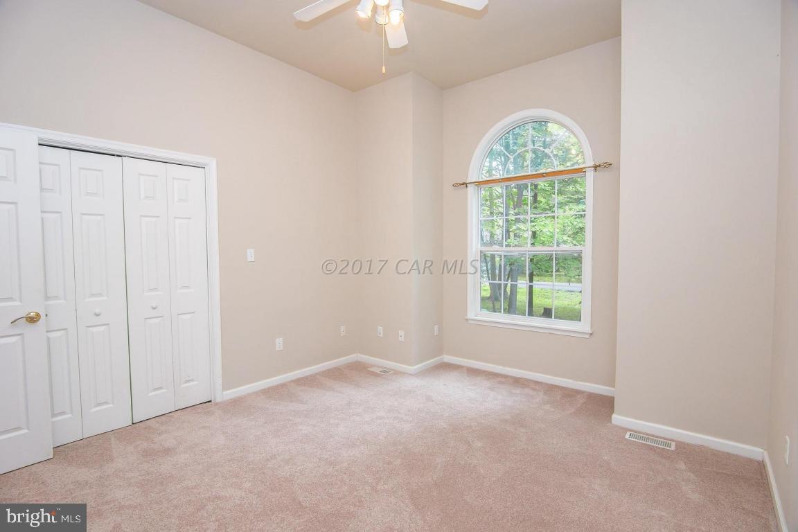 49 Beaconhill Road Ocean Pines, MD 21811 - Photo 17 of 62 an empty room with a window