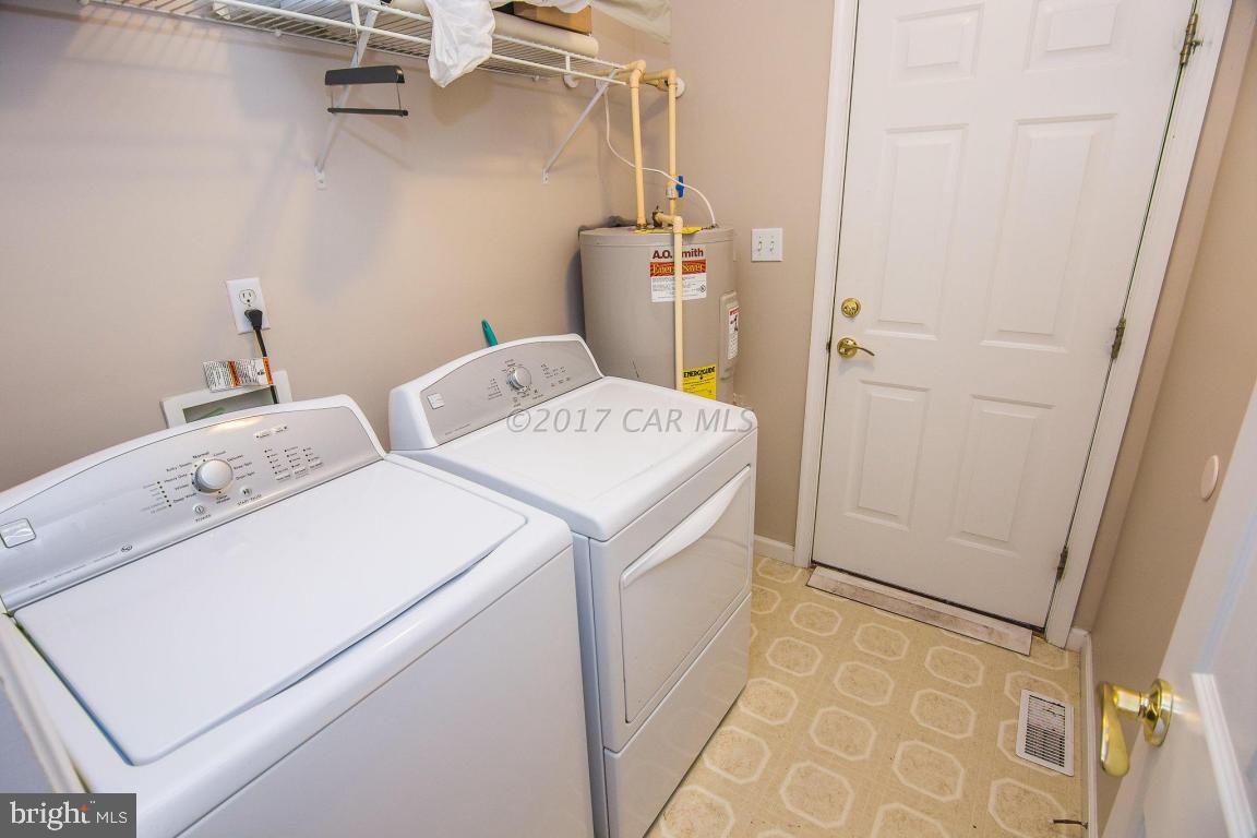 49 Beaconhill Road Ocean Pines, MD 21811 - Photo 20 of 62 a utility room with dryer and washer