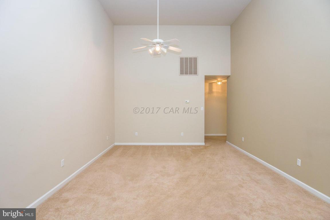 49 Beaconhill Road Ocean Pines, MD 21811 - Photo 27 of 62 a view of a chandelier in big room