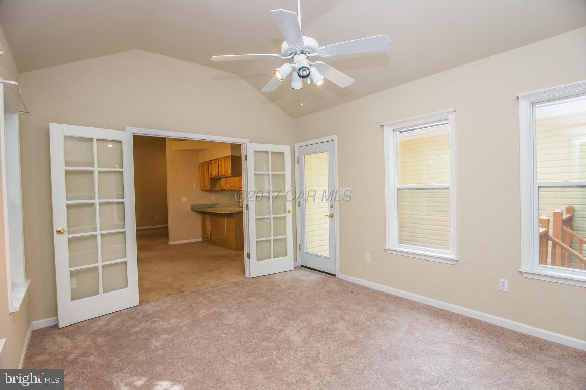 49 Beaconhill Road Ocean Pines, MD 21811 - Photo 34 of 62 a view of an empty room with a window