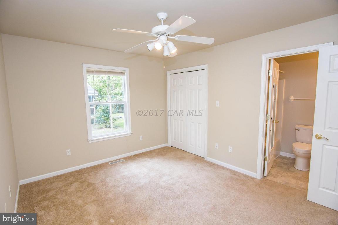 49 Beaconhill Road Ocean Pines, MD 21811 - Photo 39 of 62 a view of an empty room with a window
