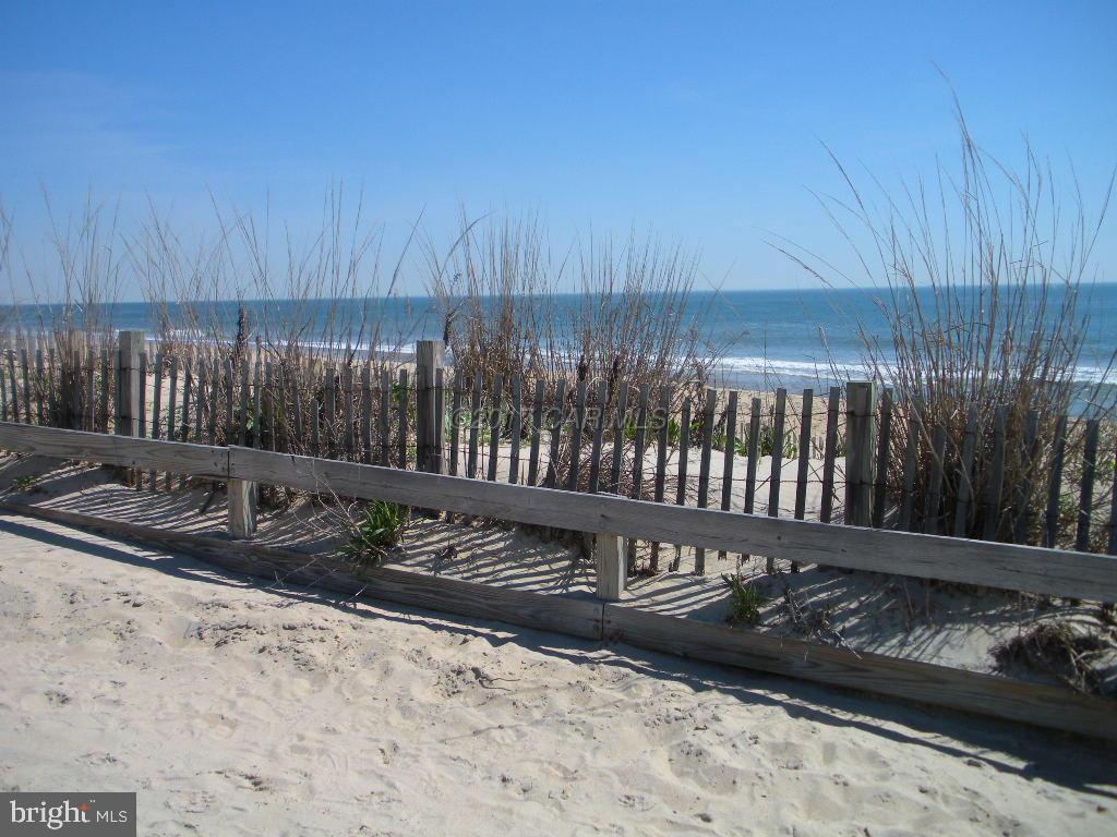 49 Beaconhill Road Ocean Pines, MD 21811 - Photo 61 of 62 a view of a backyard with wooden fence