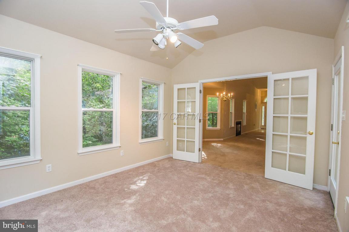 49 Beaconhill Road Ocean Pines, MD 21811 - Photo 8 of 62 a view of an empty room with a window