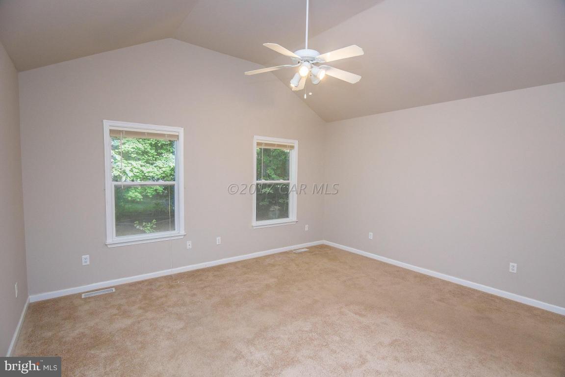 49 Beaconhill Road Ocean Pines, MD 21811 - Photo 10 of 62 a view of an empty room with a window