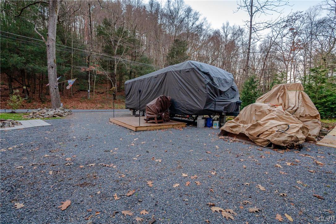 0 Laurel Road Lehighton, PA 18235 - Photo 11 of 17 a view of backyard with large trees and a parked car