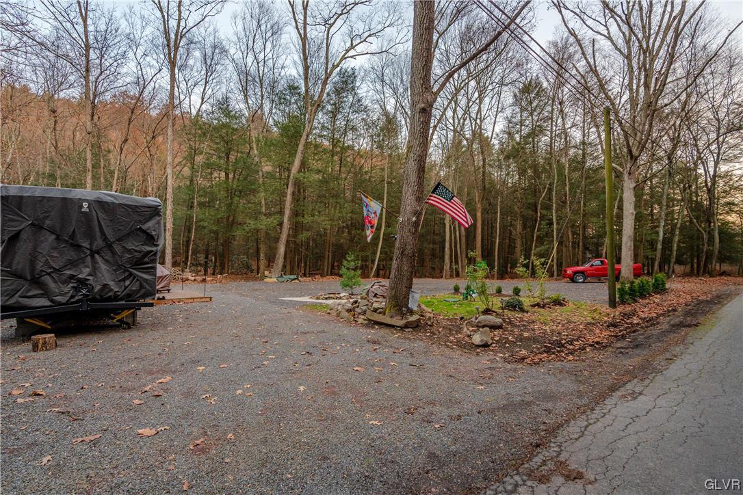 0 Laurel Road Lehighton, PA 18235 - Photo 7 of 17 a view of a park with a bench and trees