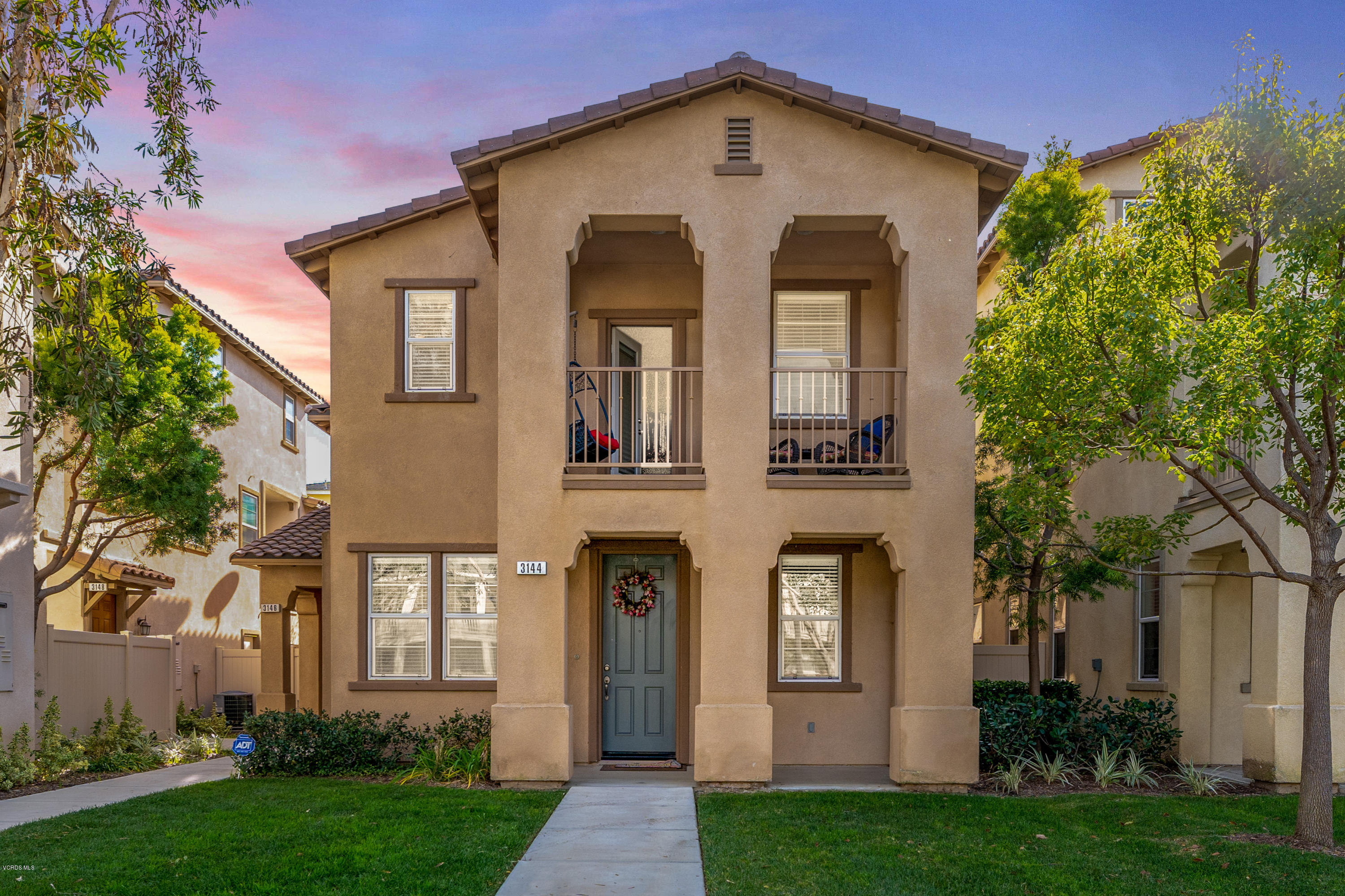 3144 North Ventura Road Oxnard, CA 93036 - Photo 1 of 18 front view of a house with a yard