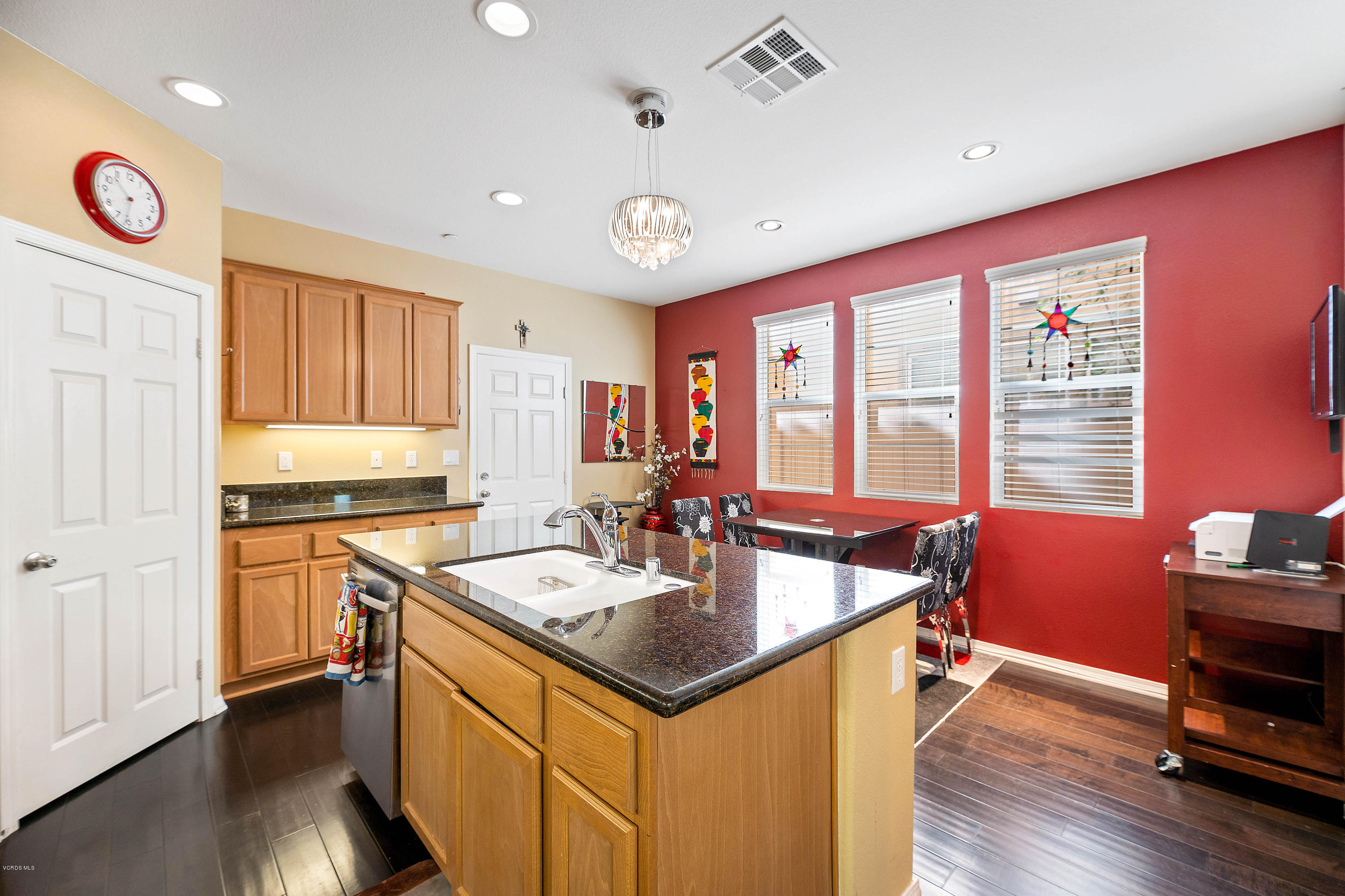 3144 North Ventura Road Oxnard, CA 93036 - Photo 4 of 18 a kitchen with stainless steel appliances granite countertop a sink a stove and a refrigerator