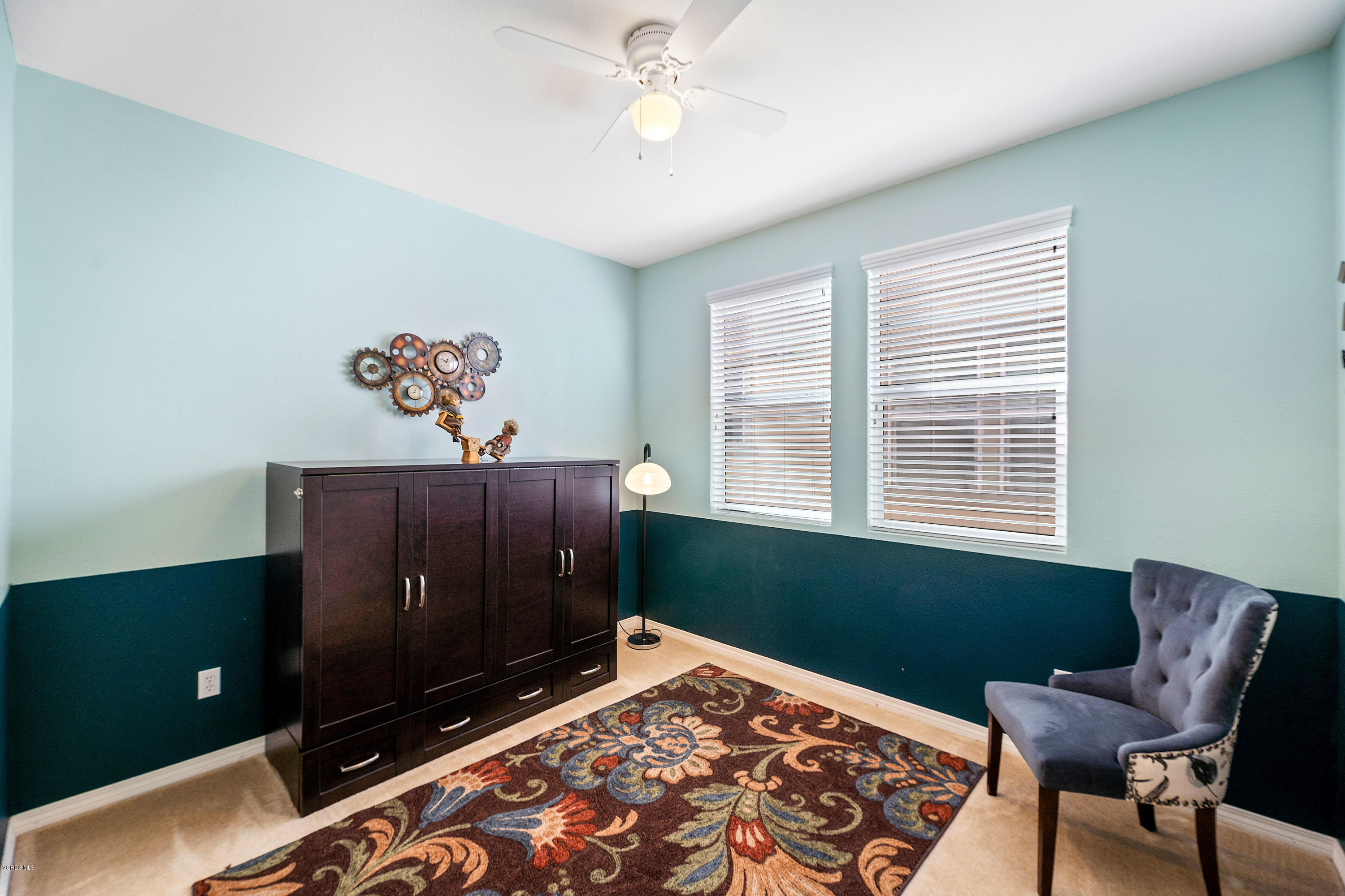 3144 North Ventura Road Oxnard, CA 93036 - Photo 8 of 18 a bedroom with a bed and window