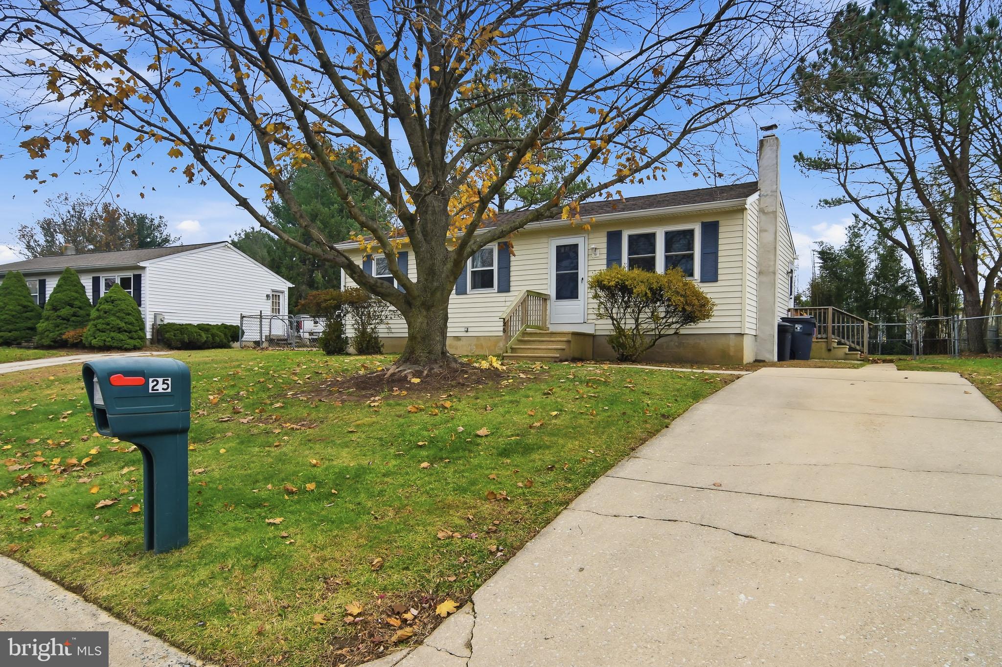25 Cherry Lane Elkton, MD 21921 - Photo 2 of 15 a front view of a house with garden