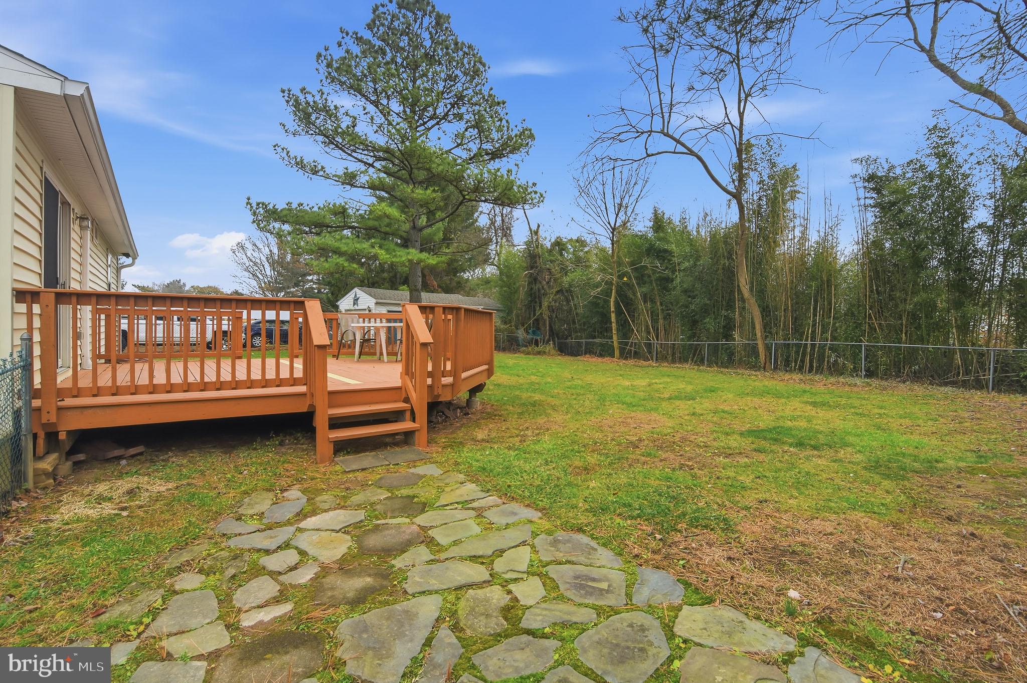 25 Cherry Lane Elkton, MD 21921 - Photo 3 of 15 a view of a backyard with a garden