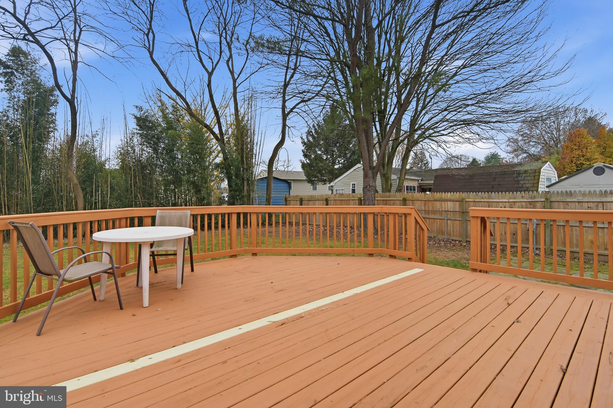 25 Cherry Lane Elkton, MD 21921 - Photo 5 of 15 a view of a chairs on deck with wooden floor and fence
