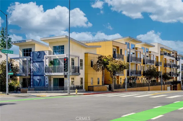 a front view of a building with street view