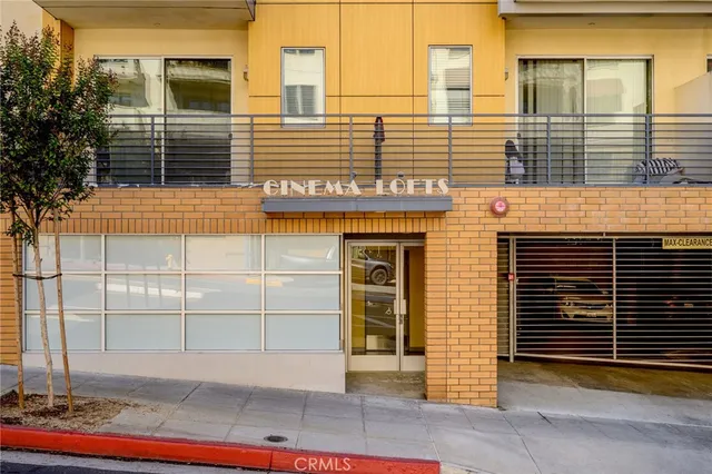 a view of a building with a door and a window