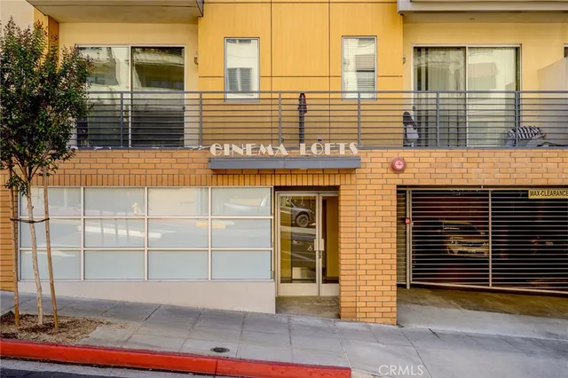 a view of a building with a door and a window