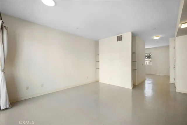 a kitchen with a refrigerator stove and microwave