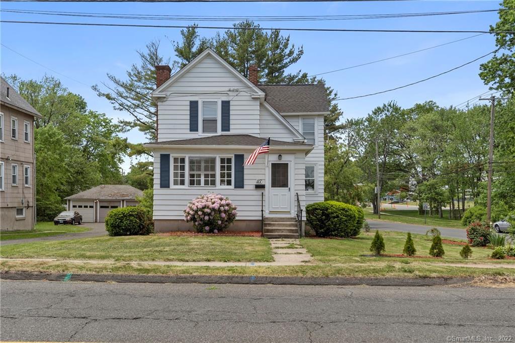 117 Wolcott Hill Road Wethersfield, CT 06109 - Photo 1 of 1 a front view of a house with a garden