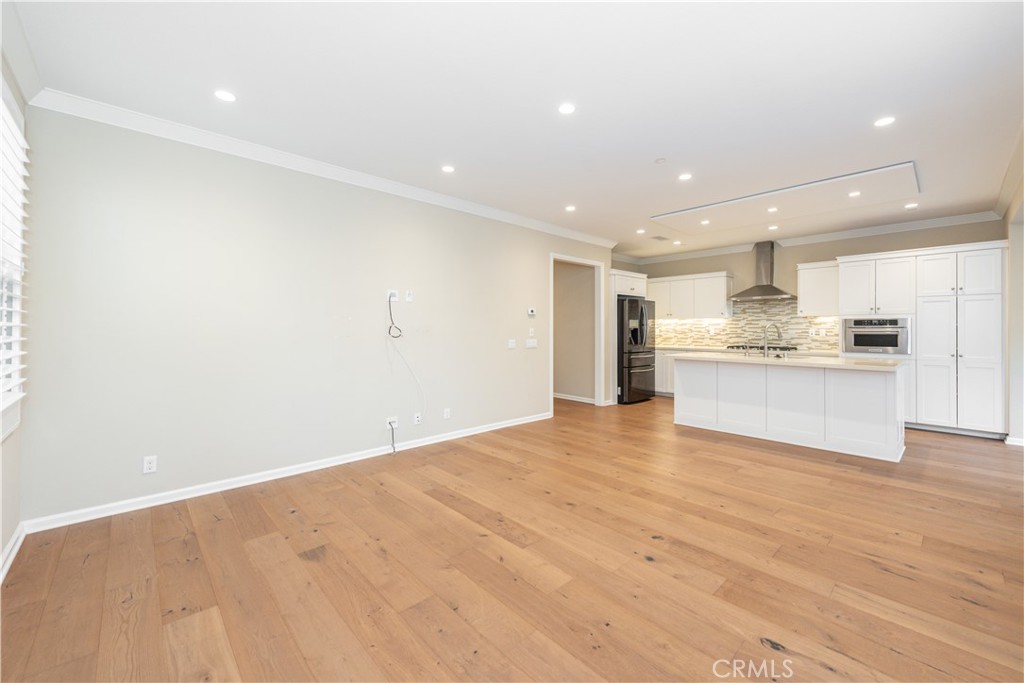 132 Gulfstream Irvine, CA 92620 - Photo 6 of 23 Living room and kitchen