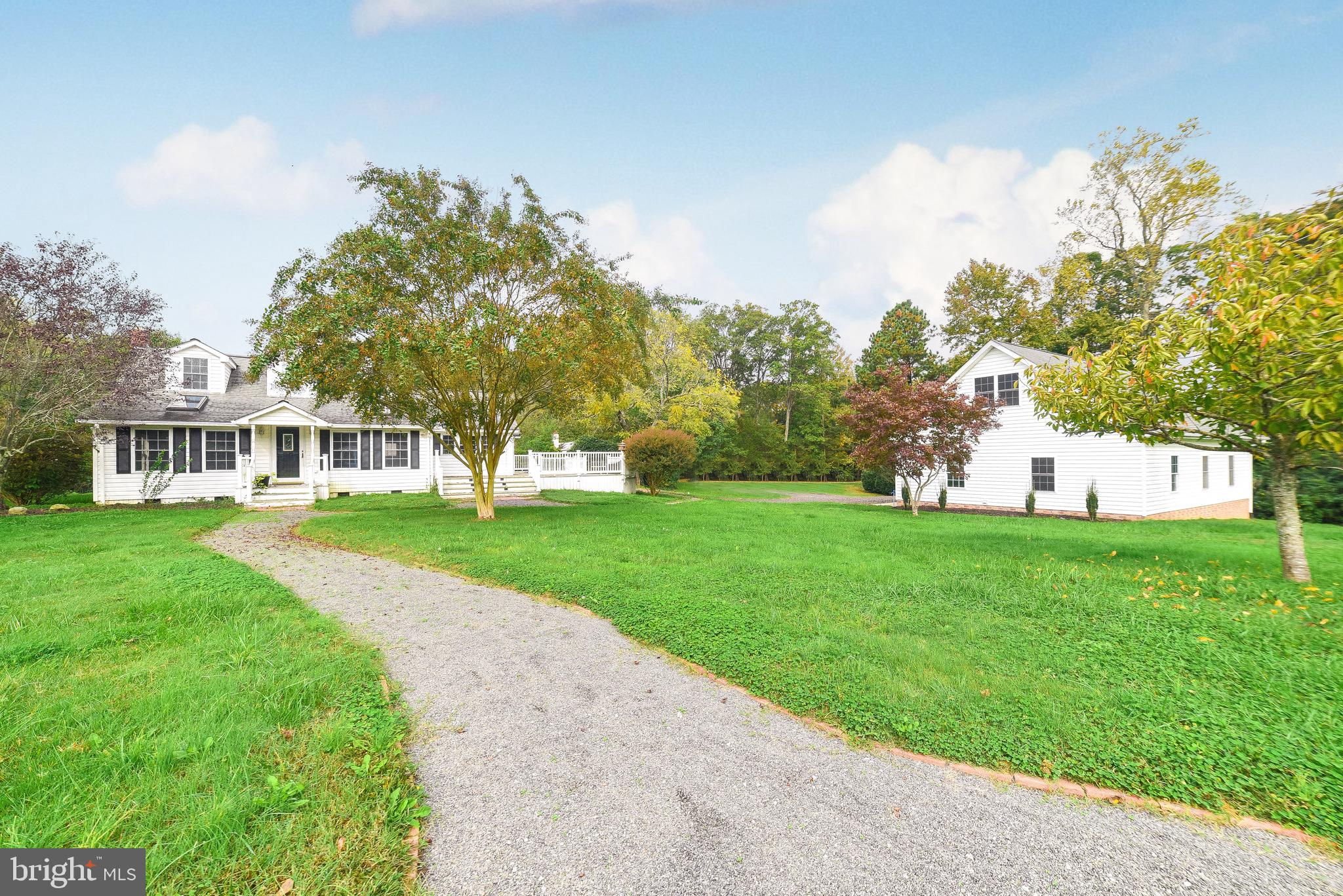 Front of Home with large detached garage
