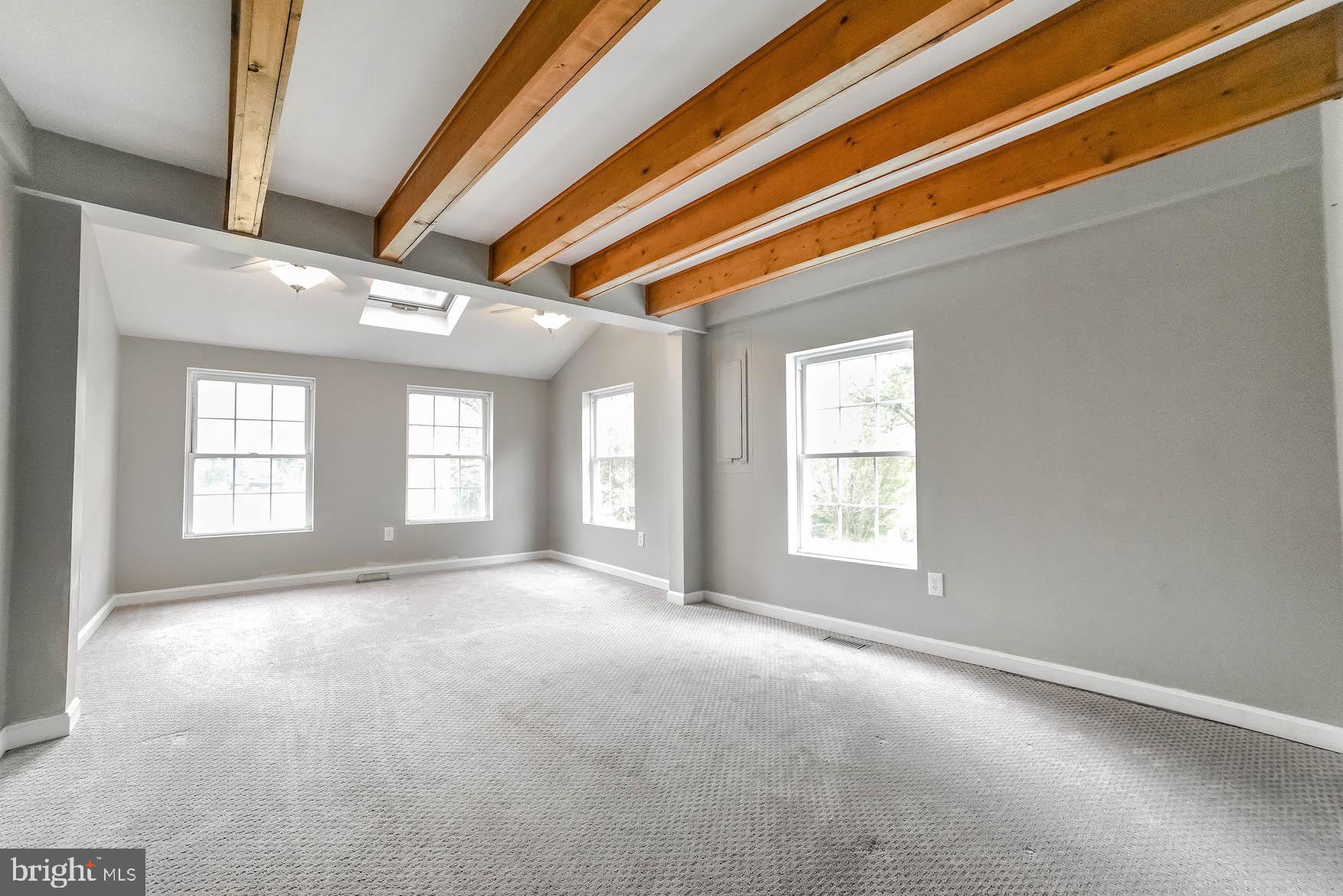 45524 Drayden Road Valley Lee, MD 20692 - Photo 12 of 51 Main level Primary bedroom with exposed beams