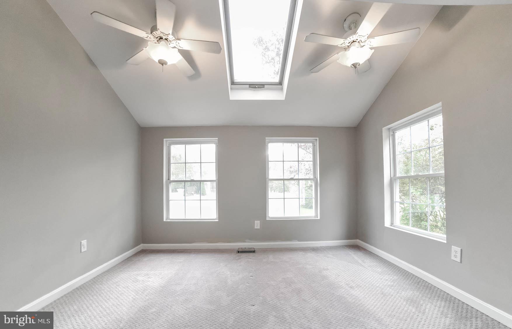 45524 Drayden Road Valley Lee, MD 20692 - Photo 13 of 51 Primary bedroom with skylight and ceiling fans