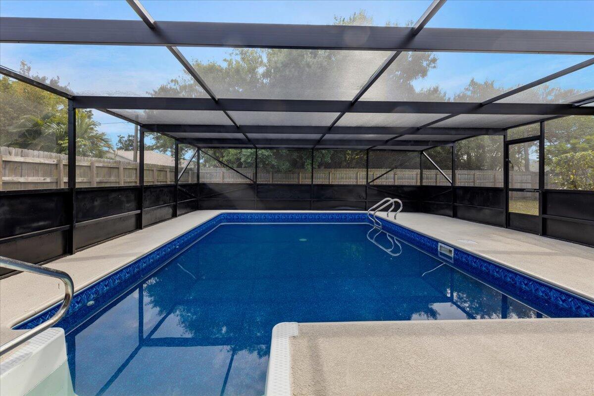 2138 Southeast Dolphin Road Port St. Lucie, FL 34952 - Photo 16 of 31 a view of a indoor swimming pool