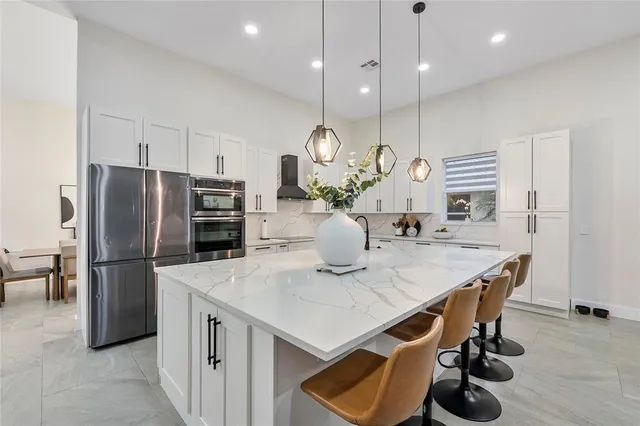 a bedroom with a bed and a desk