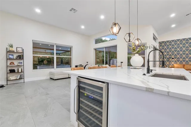 a bathroom with a sink a mirror and a toilet