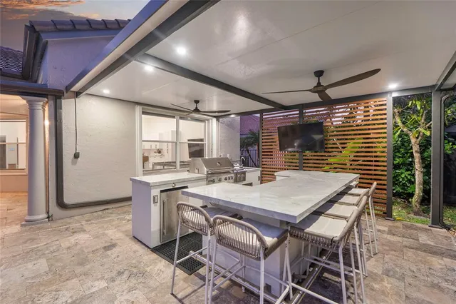 an aerial view of a house with a garden