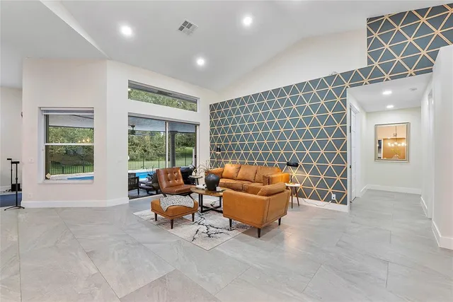 a utility room with sink dryer and washer