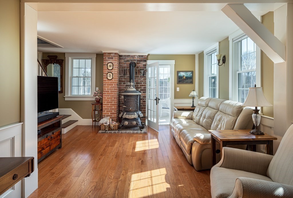 61 Ayer Road Harvard, MA 01451 - Photo 21 of 32 a living room with furniture and a large window