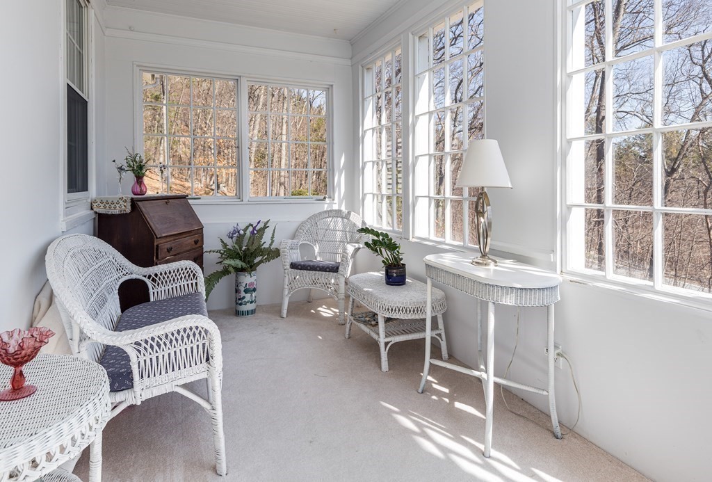 61 Ayer Road Harvard, MA 01451 - Photo 24 of 32 a living room with furniture and a large window