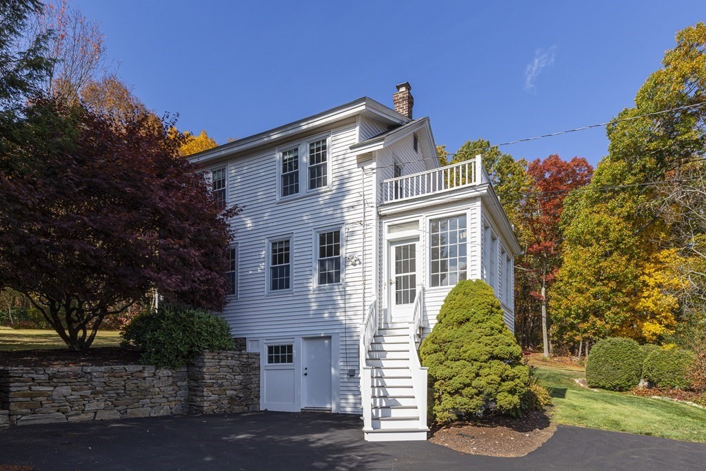 61 Ayer Road Harvard, MA 01451 - Photo 4 of 32 a view of a house with a yard