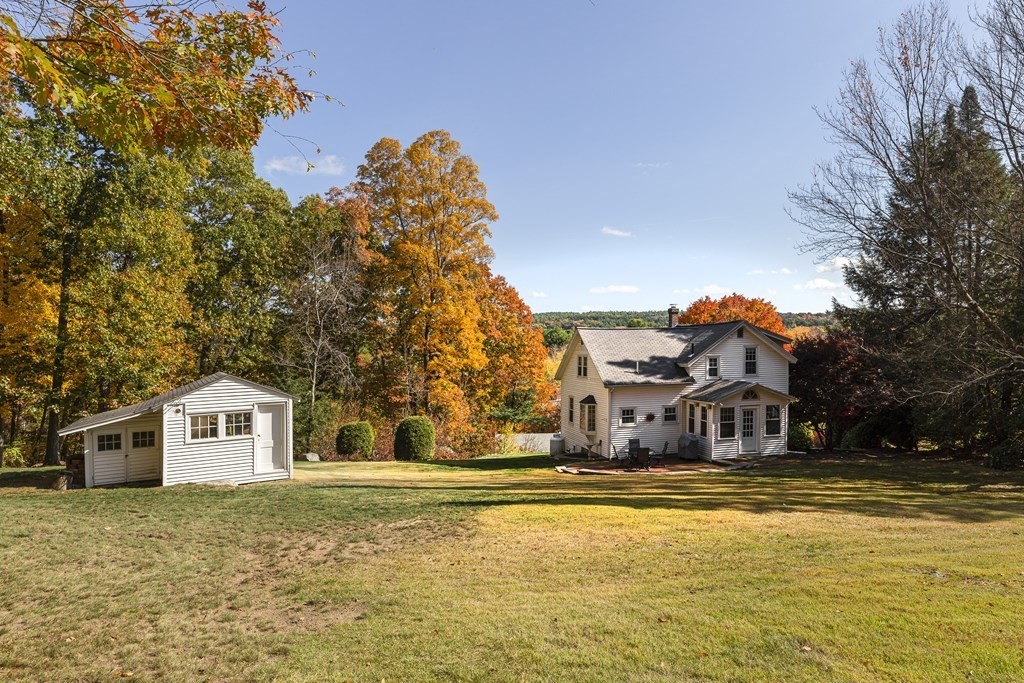 61 Ayer Road Harvard, MA 01451 - Photo 5 of 32 a house view with a outdoor space