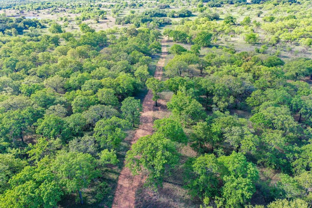 Tbd Roney Road Jacksboro, TX 76458 - Photo 6 of 40 an aerial view of residential house with outdoor space and trees all around