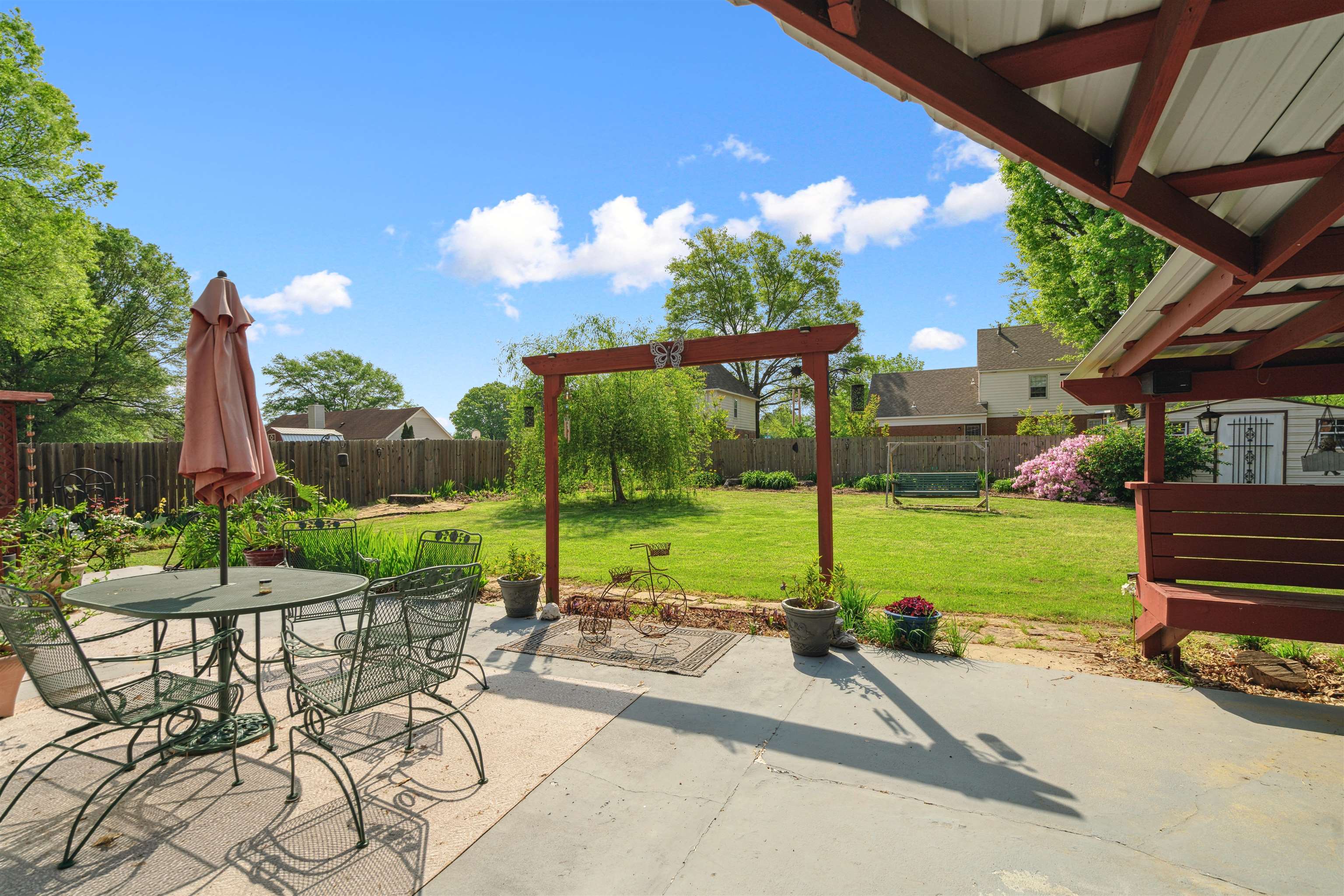 7063 Cutter Mill Road Memphis, TN 38141 - Photo 25 of 29 View of patio with a fenced backyard and outdoor dining space
