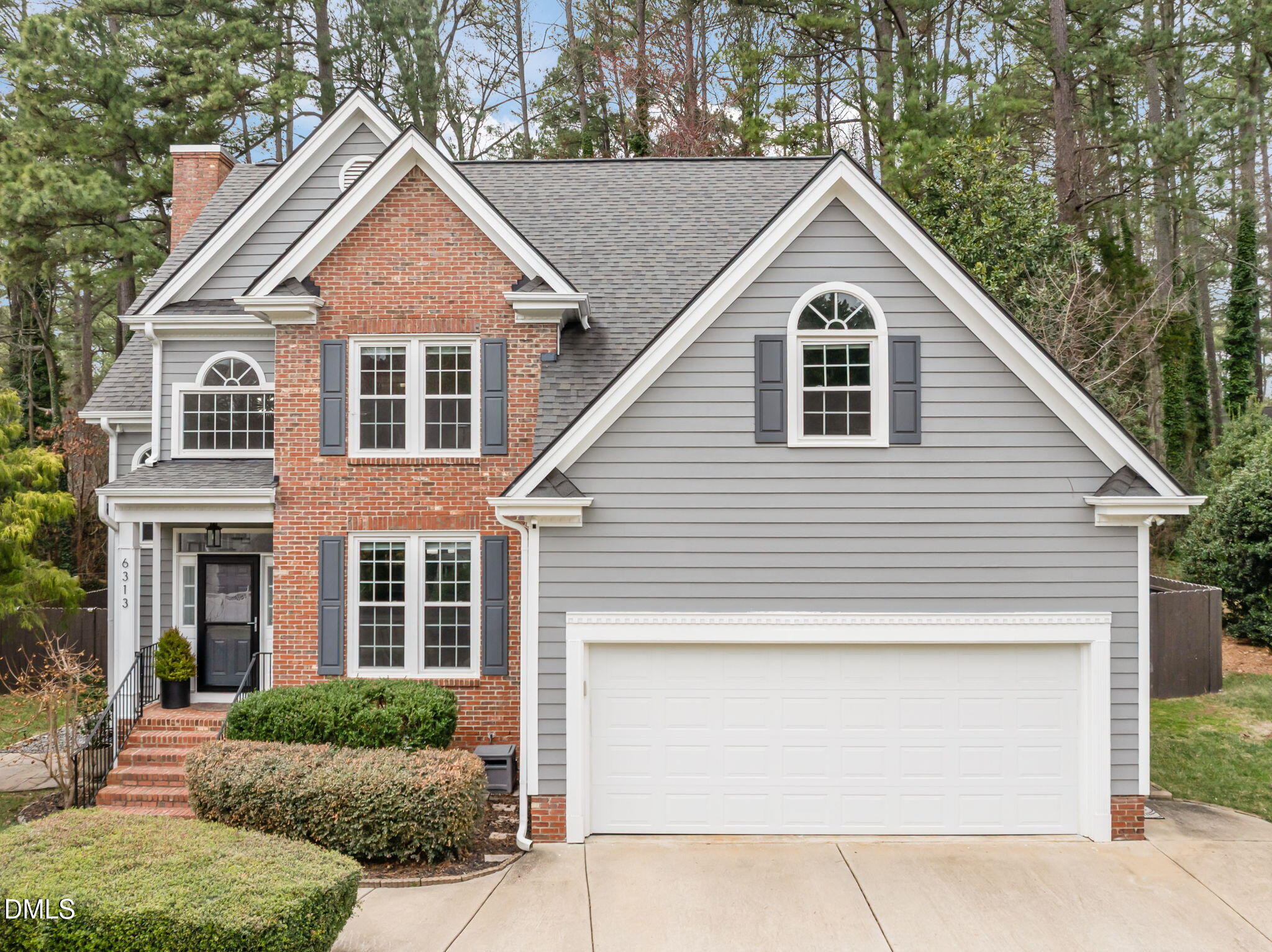 6313 Ashley Ridge Drive Raleigh, NC 27612 - Photo 1 of 41 a view of house and outdoor space with yard