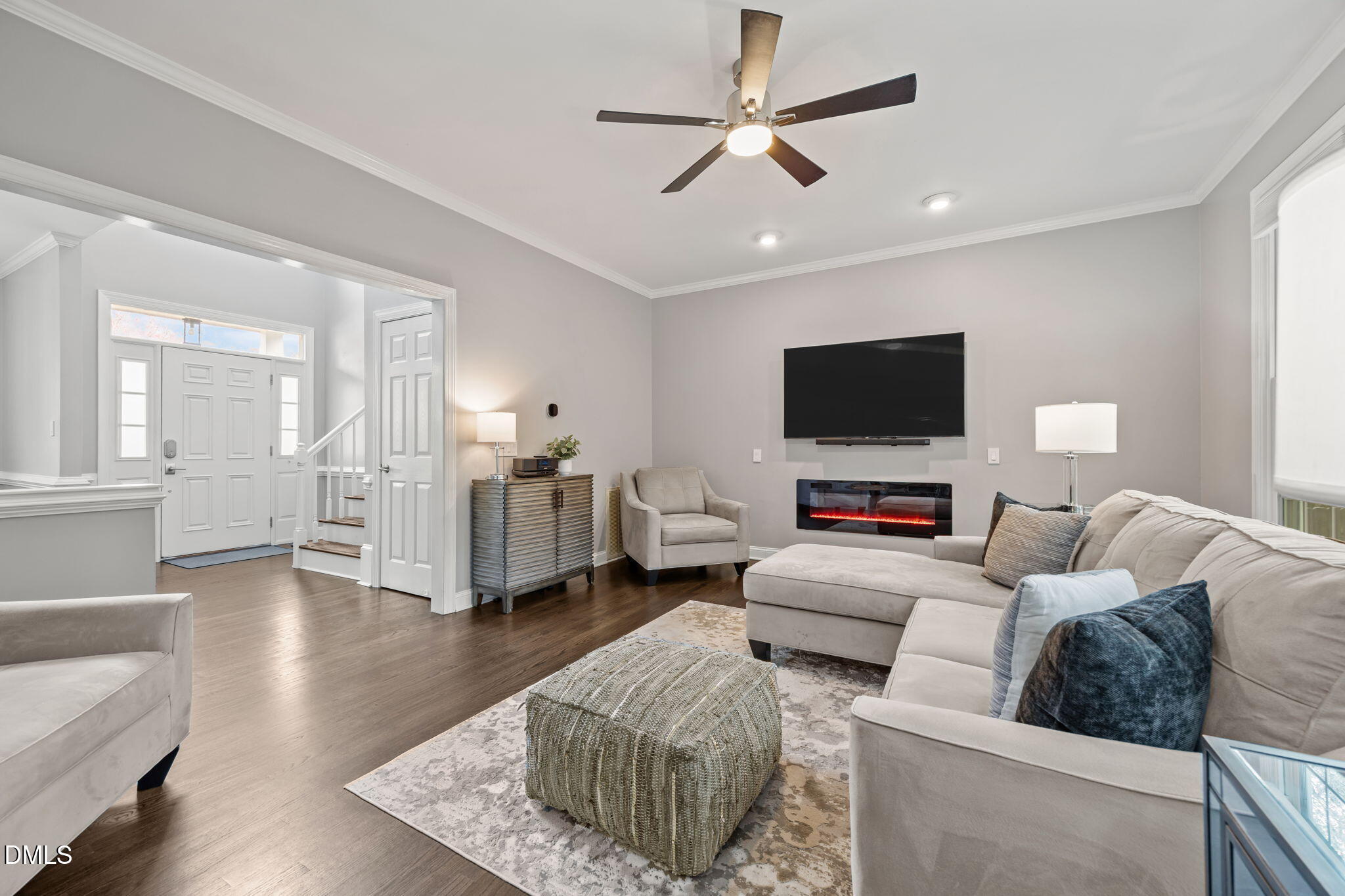 6313 Ashley Ridge Drive Raleigh, NC 27612 - Photo 15 of 41 a living room with furniture and a flat screen tv