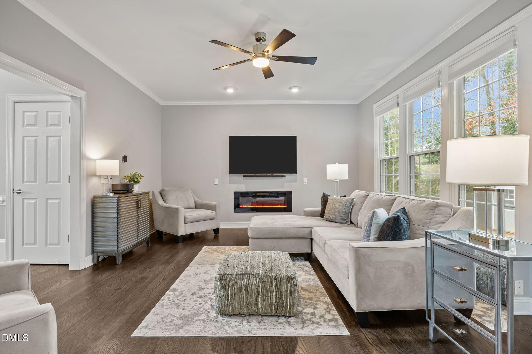 6313 Ashley Ridge Drive Raleigh, NC 27612 - Photo 16 of 41 a living room with furniture fireplace and a flat screen tv