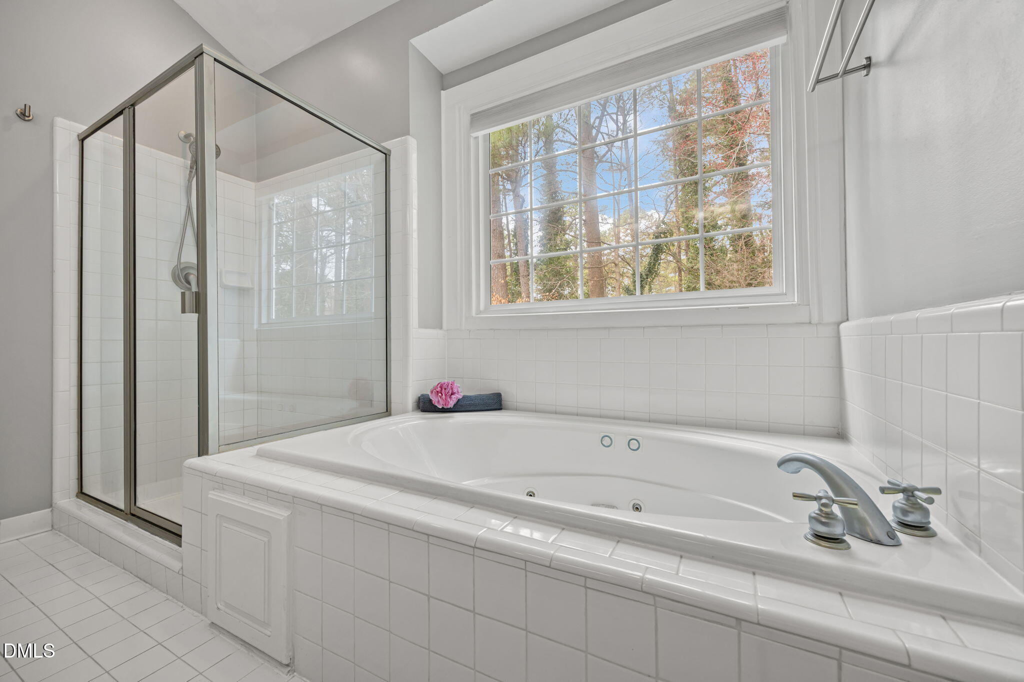 6313 Ashley Ridge Drive Raleigh, NC 27612 - Photo 22 of 41 a bathroom with a granite countertop sink a shower and a bathtub