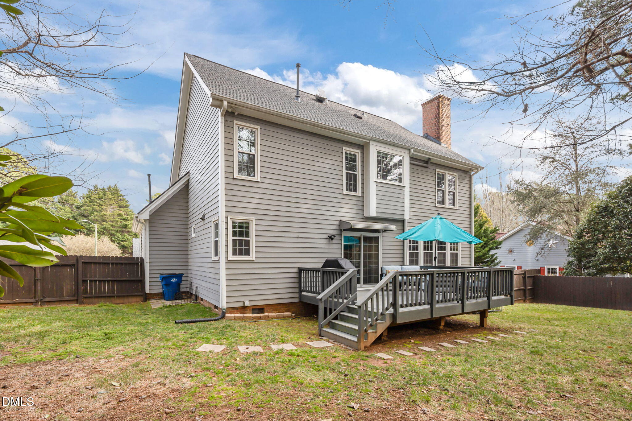 6313 Ashley Ridge Drive Raleigh, NC 27612 - Photo 29 of 41 a view of a house with a yard and deck