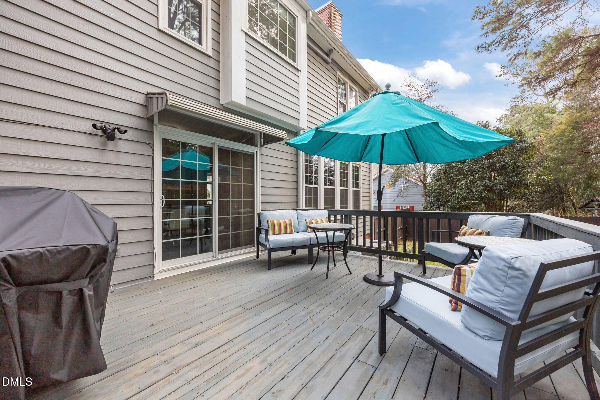 6313 Ashley Ridge Drive Raleigh, NC 27612 - Photo 32 of 41 a view of balcony with wooden floor and outdoor seating